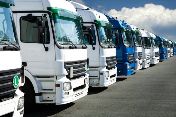 A line of trucks in the car park